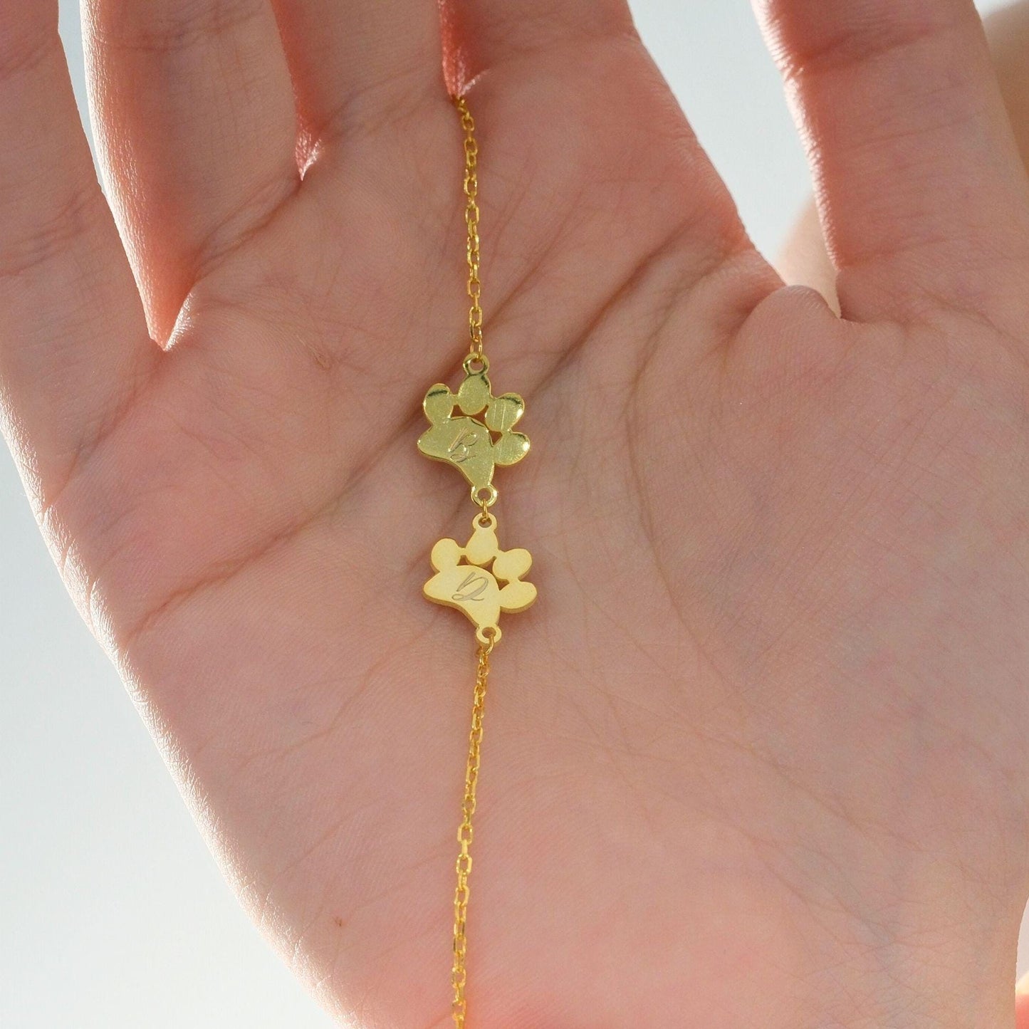 Paw Print Bracelet with Sparkling Paw Charms and Initials of Loved Ones